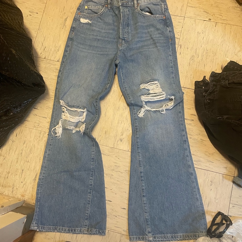We are free distressed jeans brand new size 27 in young lady’s